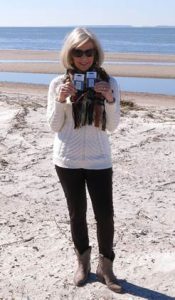 Sarah Gunn at Edisto Island wearing Style Arc "Elle" slim leg pants and holding SCHMETZ needle packs.